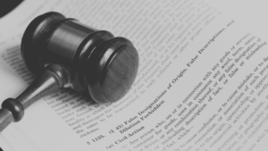 a gavel lying on a document