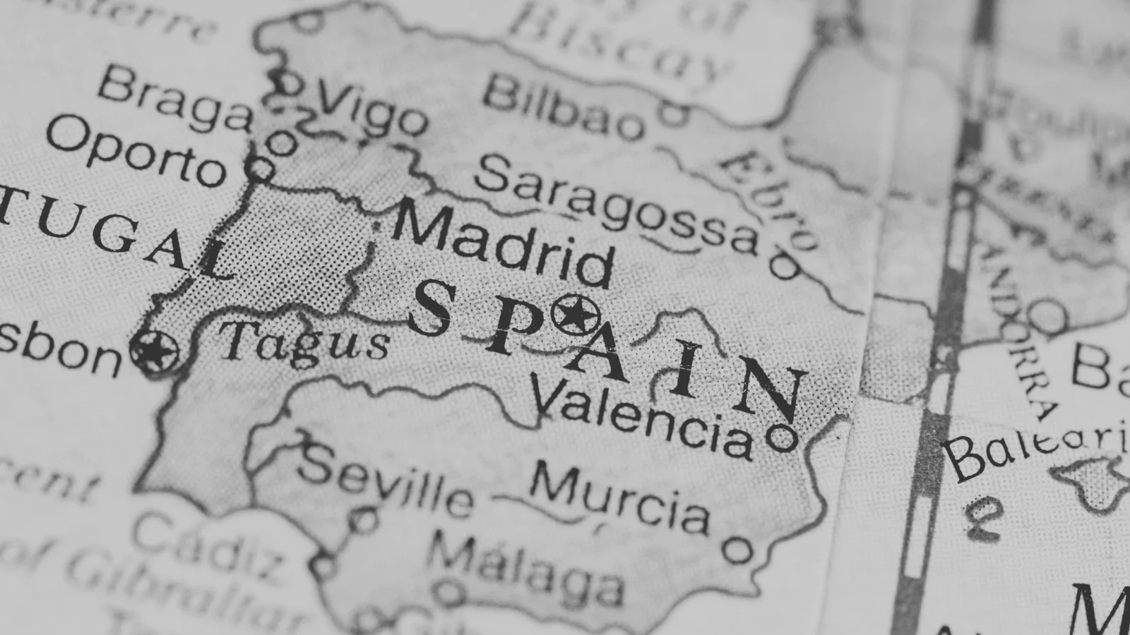 a map of spain with black text
